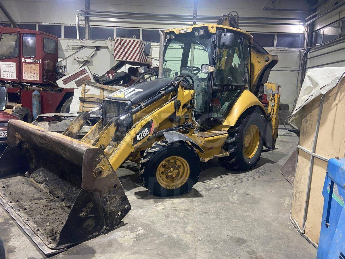 Экскаватор-погрузчик CAT428E, 2011 года - Изображение 1